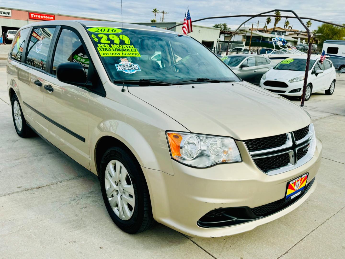 2016 gold Dodge Grand Caravan (2C4RDGBG3GR) , located at 2190 Hwy 95, Bullhead City, AZ, 86442, (928) 704-0060, 0.000000, 0.000000 - 2016 Dodge Grand Caravan SE. *1 owner. Only 52k original miles. Super clean. elderly owned. Brand new tires. Completely serviced. Free Warranty. Free carfax. - Photo#1